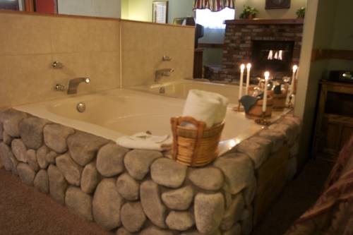 Imagen de la habitación del Hotel Sleepy Forest Cottages. Foto 14