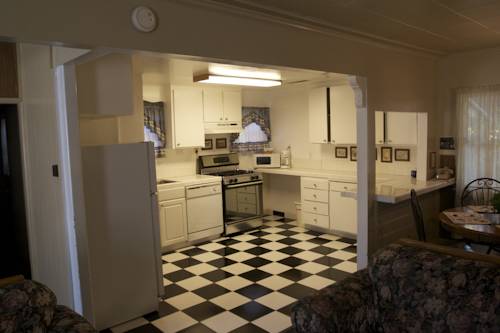 Imagen de la habitación del Hotel Sleepy Forest Cottages. Foto 15