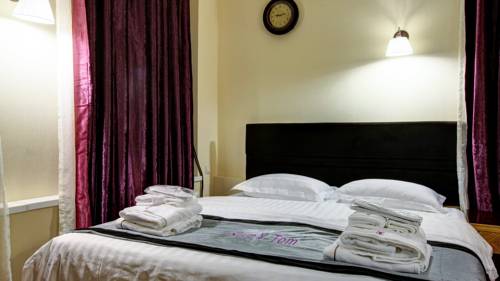 Imagen de la habitación del Hotel Sleepy Tom. Foto 5