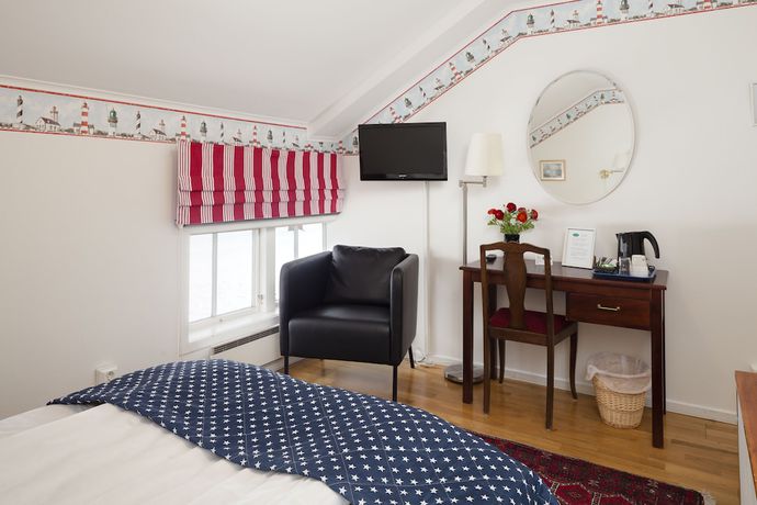 Imagen de la habitación del Hotel Slottsgården. Foto 7