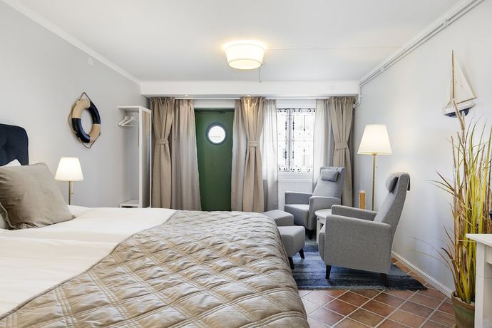 Imagen de la habitación del Hotel Slottsgården. Foto 14