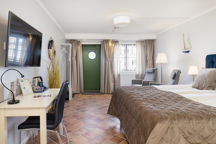 Imagen de la habitación del Hotel Slottsgården. Foto 16