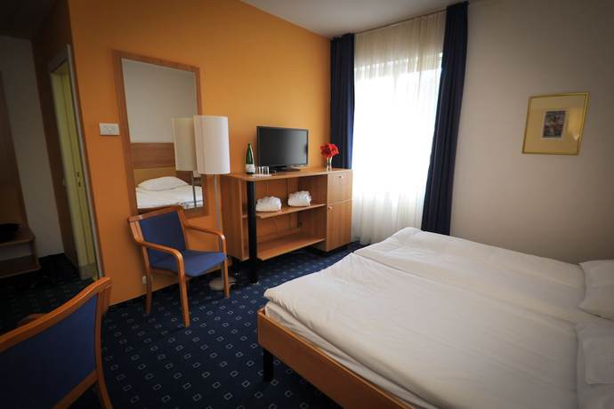 Imagen de la habitación del Hotel Slovenija. Foto 18