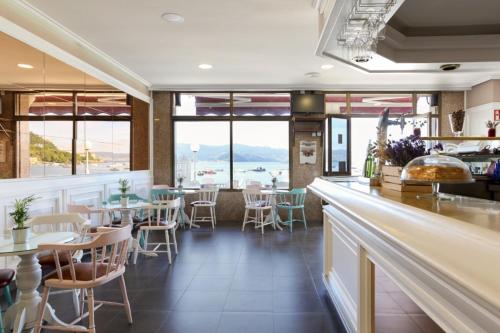 Imagen del bar/restaurante del Hotel Slow Beach Hotel Gran Proa. Foto 2