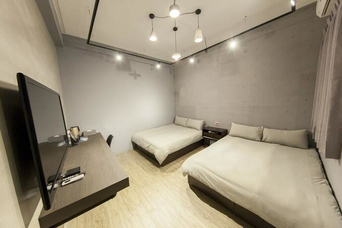 Imagen de la habitación del Hotel Slow Inn. Foto 19