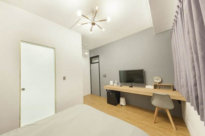 Imagen de la habitación del Hotel Slow Inn. Foto 23