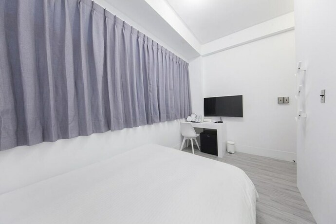 Imagen de la habitación del Hotel Slow Inn. Foto 24