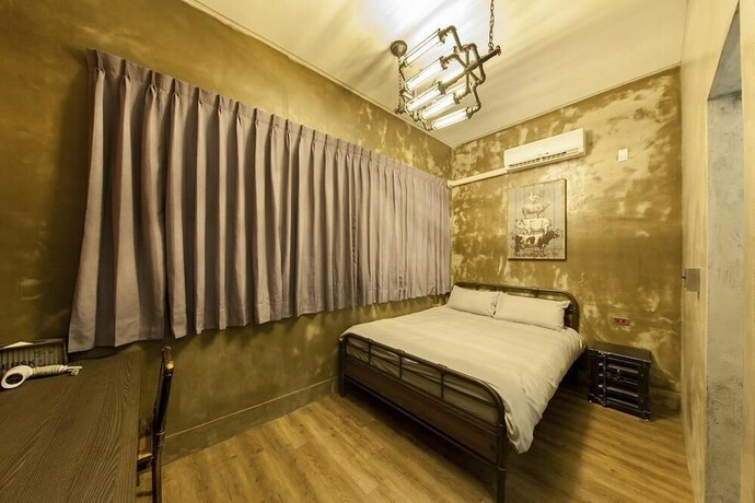Imagen de la habitación del Hotel Slow Inn. Foto 32