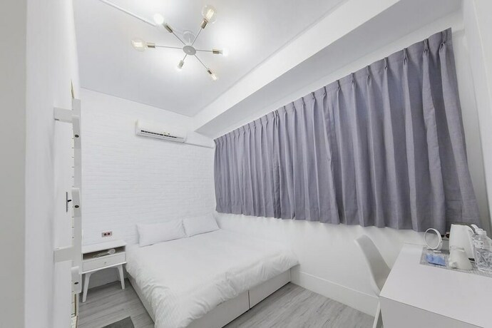 Imagen de la habitación del Hotel Slow Inn. Foto 34