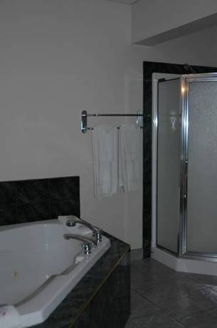 Imagen de la habitación del Hotel Slumber Lodge. Foto 12