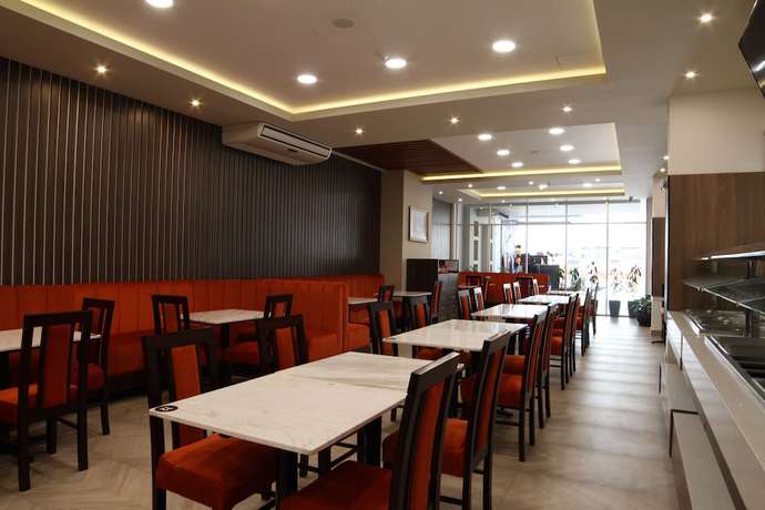 Imagen del bar/restaurante del Hotel Sm Plus. Foto 3