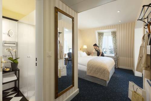 Imagen de la habitación del Hotel Small Luxury Ambassador Zürich. Foto 13