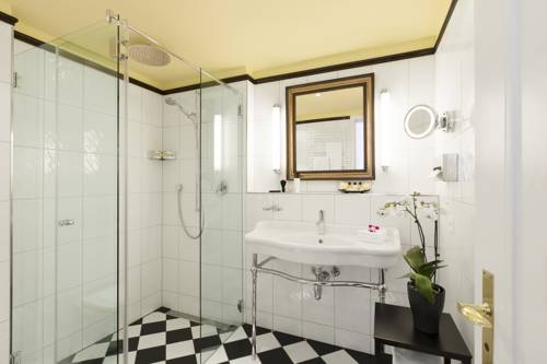 Imagen de la habitación del Hotel Small Luxury Ambassador Zürich. Foto 14