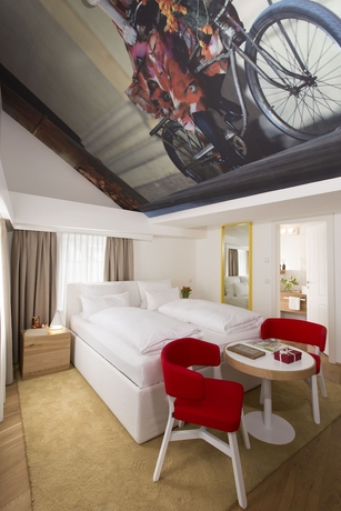 Imagen de la habitación del Hotel Small Luxury Goldgasse. Foto 8