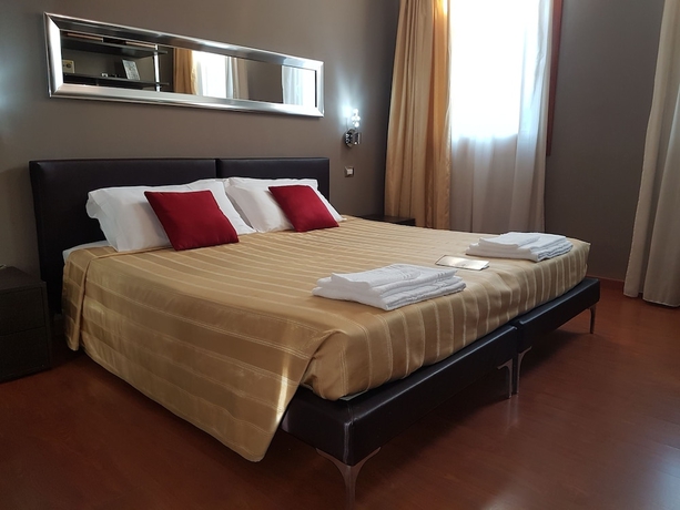 Imagen de la habitación del Hotel Small Royal. Foto 8