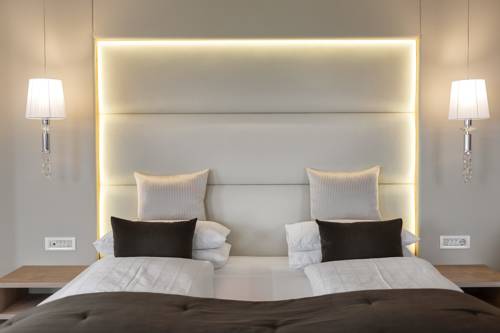 Imagen de la habitación del Hotel Small & Beautiful Gnaid. Foto 7