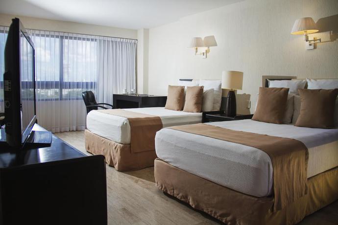 Imagen de la habitación del Hotel Smart Cancun By Oasis. Foto 6