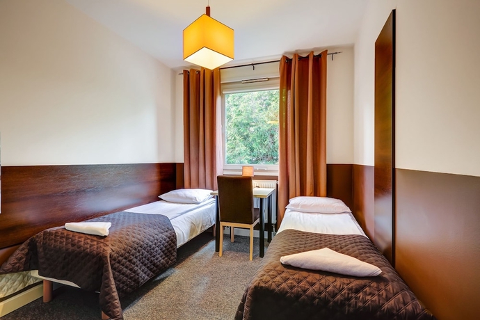 Imagen de la habitación del Hotel Smart2stay Magnolia. Foto 2