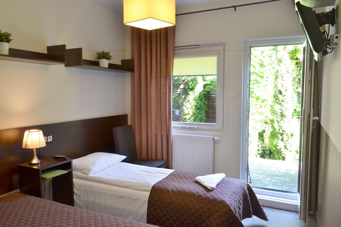 Imagen de la habitación del Hotel Smart2stay Magnolia. Foto 4
