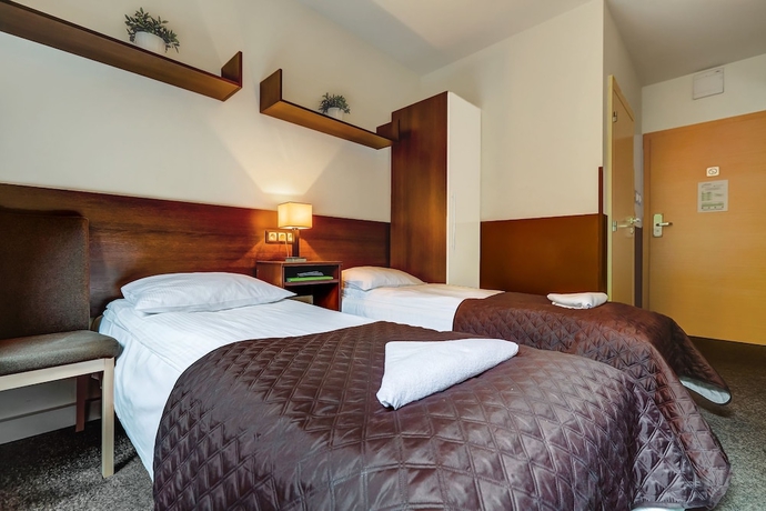 Imagen de la habitación del Hotel Smart2stay Magnolia. Foto 7