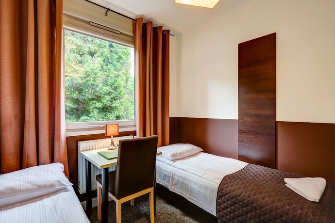 Imagen de la habitación del Hotel Smart2stay Magnolia. Foto 10