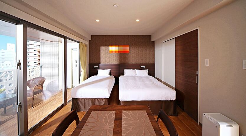 Imagen de la habitación del Hotel Smartcondo Tomari. Foto 12