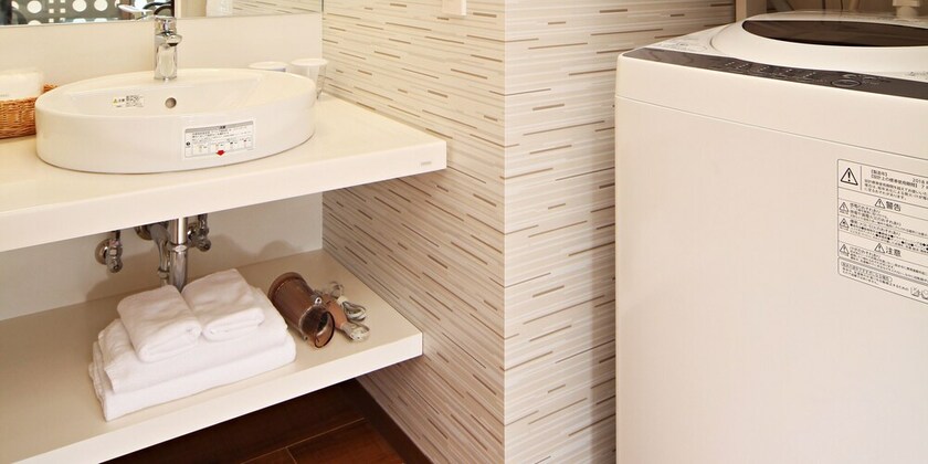 Imagen de la habitación del Hotel Smartcondo Tomari. Foto 13