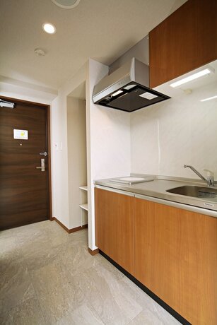 Imagen de la habitación del Hotel Smartcondo Tomari. Foto 14