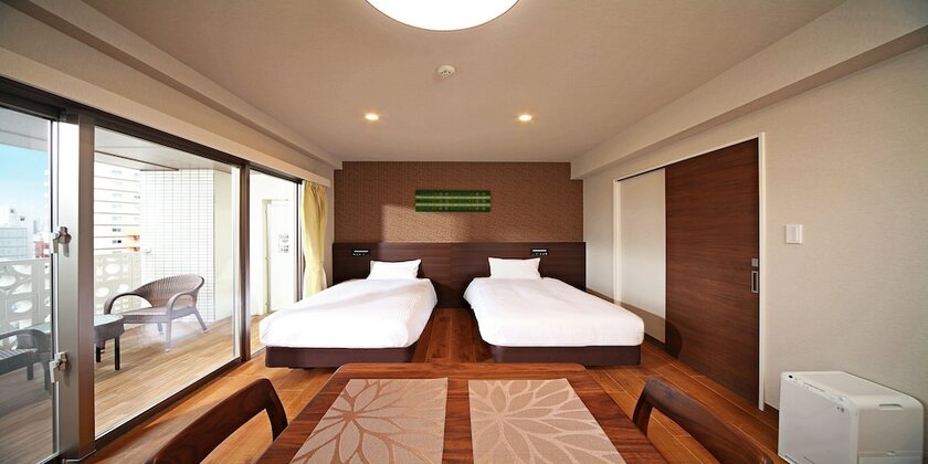 Imagen de la habitación del Hotel Smartcondo Tomari. Foto 15