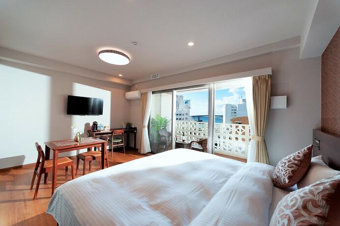 Imagen de la habitación del Hotel Smartcondo Tomari. Foto 17
