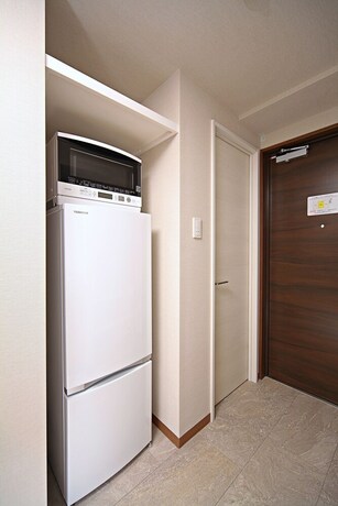 Imagen de la habitación del Hotel Smartcondo Tomari. Foto 21