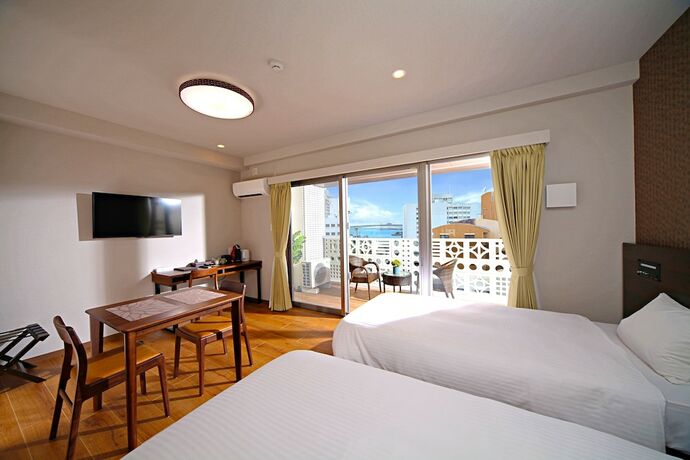 Imagen de la habitación del Hotel Smartcondo Tomari. Foto 26