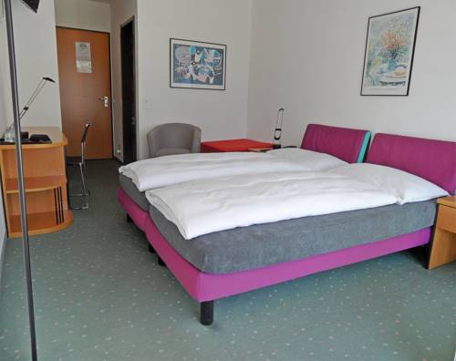 Imagen de la habitación del Hotel Smart-hotel Minusio. Foto 13