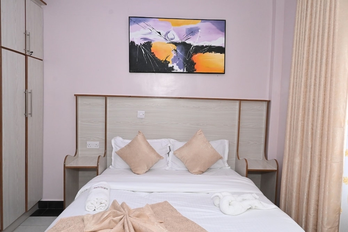 Imagen de la habitación del Hotel Smartstay Mungai Heights. Foto 3