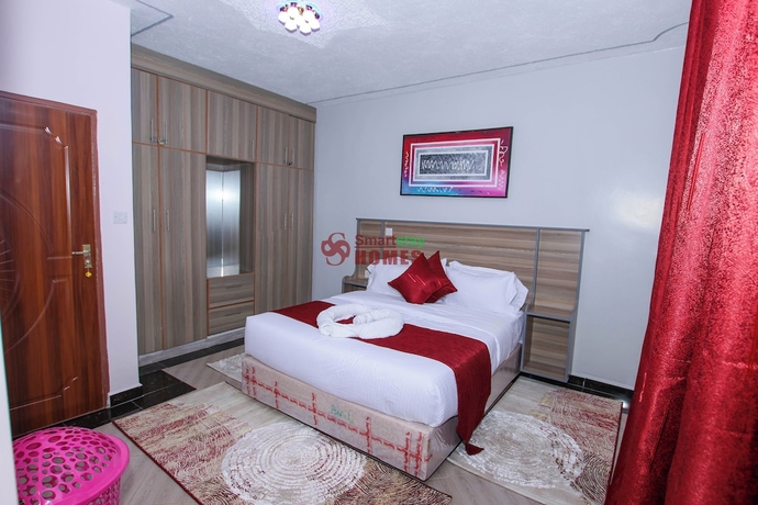 Imagen de la habitación del Hotel Smartstay Mungai Heights. Foto 5
