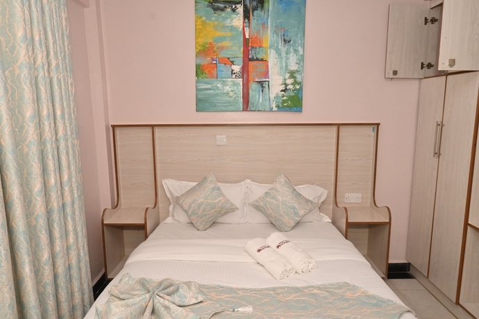 Imagen de la habitación del Hotel Smartstay Mungai Heights. Foto 6