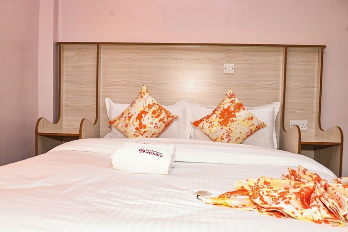 Imagen de la habitación del Hotel Smartstay Mungai Heights. Foto 10