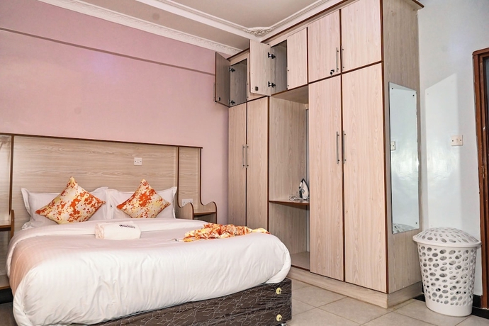 Imagen de la habitación del Hotel Smartstay Mungai Heights. Foto 11