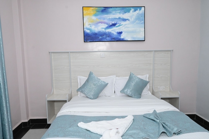 Imagen de la habitación del Hotel Smartstay Mungai Heights. Foto 12
