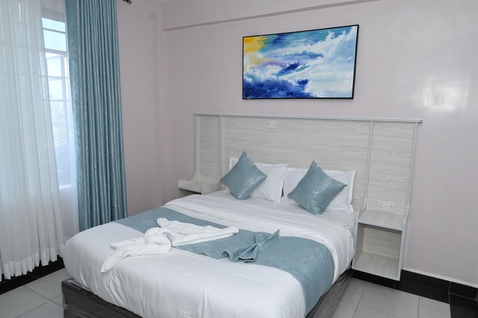 Imagen de la habitación del Hotel Smartstay Mungai Heights. Foto 14