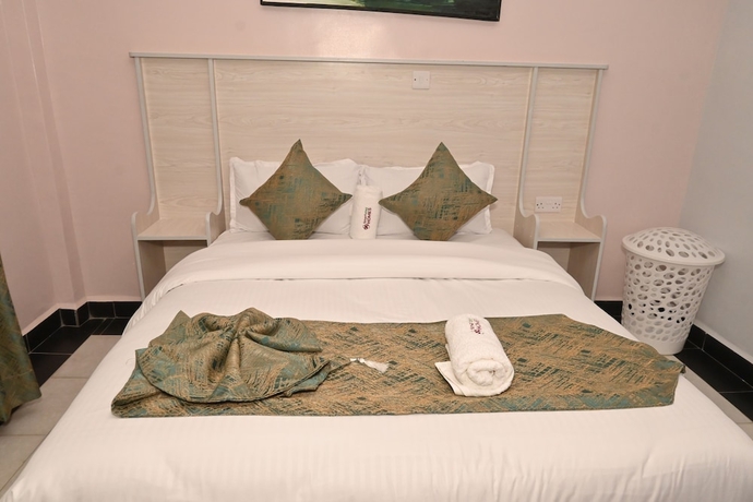 Imagen de la habitación del Hotel Smartstay Mungai Heights. Foto 16