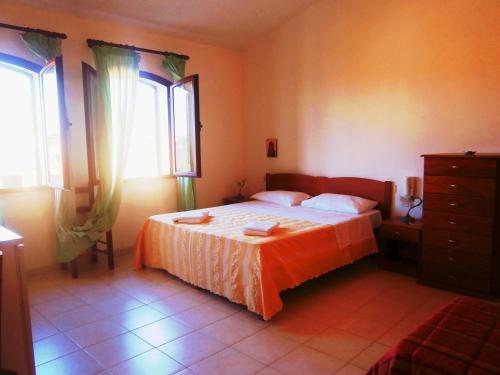 Imagen de la habitación del Hotel Smeraldo AFFITTA CAMERE. Foto 8