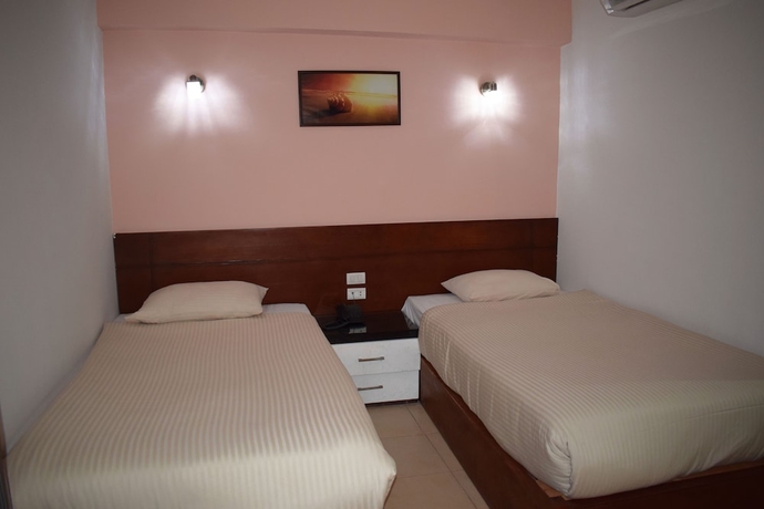 Imagen de la habitación del Hotel Smg Travel. Foto 6