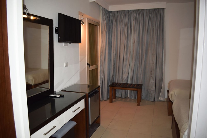 Imagen de la habitación del Hotel Smg Travel. Foto 8