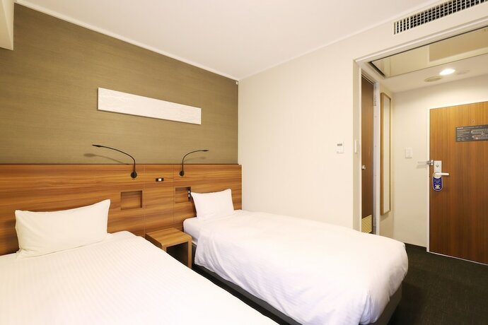 Imagen de la habitación del Hotel Smile Aomori. Foto 20