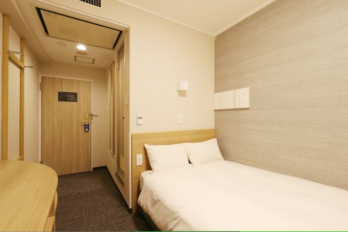 Imagen de la habitación del Hotel Smile Aomori. Foto 21