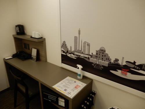 Imagen de la habitación del Hotel Smile Hiroshima. Foto 20