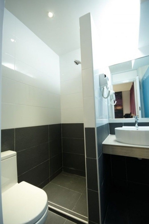 Imagen de la habitación del Hotel Smile Hotel Chow Kit PWTC. Foto 3