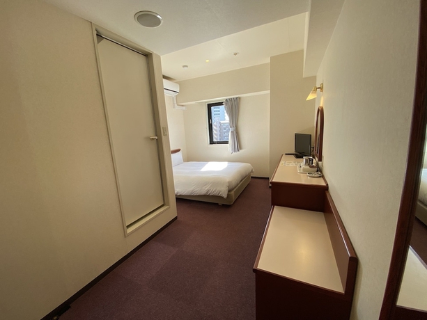 Imagen de la habitación del Hotel Smile Hotel Kitaasaka. Foto 10