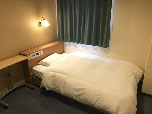 Imagen de la habitación del Hotel Smile Hotel Takaoka Ekimae. Foto 12